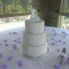 3 tiered Round diamond wedding cake. Unfortunetly the florist did not show up by the time we had finished setting up this cake, but picture it with fresh purple orchids on it(hopefully they showed up before the wedding!) 