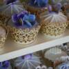 Close up of the sugar hydrangeas made for these fondant covered wedding cupcakes.