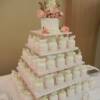 Round blush pink miniature wedding cakes with a 6" round cutting cake. 