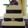 3 tiered Royal Purple and Gold wedding cake.