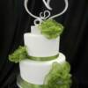 2 tiered Green Fabric Flower Wedding Cake with a heart wedding cake topper. 