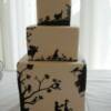 4 tier (bottom tier is a double tier) square hand-painted wedding cake.