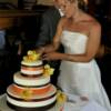 The beautiful Bride & Groom cutting their cake