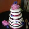 Purple Peoni cake. 3 tiered, round wedding cake that had the top tier made out of our wine paired Death by Chocolate Cake with Whipped Chocolate Ganache and Cabernet Sauvignon