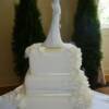 3 tier Square White Hydrangea Wedding Cake. This 3 tiered cake was made wtih Chocolate Chiffon cake and Whipped Chocolate Ganache Filling.