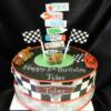 CARS 2 themed birthday cake. This birthday cake was made for Tyler' 5th birthday. He picked our Chocolate Cake with Vanilla Bean Buttercream filling to be used in his cake. 