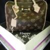 Louise Vouton Birthday Purse. This life-size replica was made for a 40th birthday celebration- everything you see here is edible!!