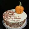 12" Round Birthday Cake. This Henna Inspired Birthday cake was made for a 30th birhday close to Halloween. The hand-made pumpkin you see on the cake was made out of fondant and is completely edible (and tastier than its other edible counterpart!). 