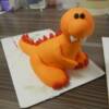 Close-up of the hand-made fondant dinosaur that was made for this cake...we named him Herman. 