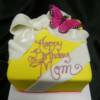 Yellow and Pink Birthday Cake with a white bow and butterfly