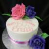Pink and Purple Sugar Roses on our white Birthday Cake.