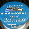 8" round Seattle Seahawks birthday cake.
This cake was made with our Chocolate Chiffon cake with Amaretto Mocha Buttercream filling. 
