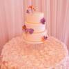 3 tier round Ivory and Gold wedding cake with handmade (by us) sugar pansies.