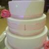 Close-up of the detail done on this wedding cake. 