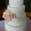 4 tier round Fondant Ruffles Wedding Cake with a Pale Pink Sugar Peony. 