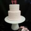 Our new favorite cake, this very sweet 2 tier Pale Pink wedding cake had the E.E. Cummings poem, " I carry your heart (in my heart)" hand-piped on the cake. A "Love" cake topper was added to this cake, along with a miniature Gluten Free cake in its own clear box for a celiac guets. 