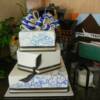 3 tier square and hexagon wedding cake with details designed by the bride.