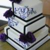 Side view of the Black wrapped wedding cake.