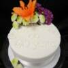 Diamond White 60th Wedding Anniversary cake with fresh flowers  and sugar diamonds. 