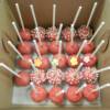 Red Birthday Cake Pops in assorted designs. 
