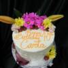 8" round Buttercream covered birthday cake with fresh flowers. 