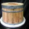 Sculpted Wine Barrel Birthday cake. This 12" high wine barrell was made out of fondant and hand painted to make it look like wood staves. 