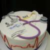 Nurse Celebration Cake- Some details on top of this cake include a stethascope, perscription paper, face mask and pills!
